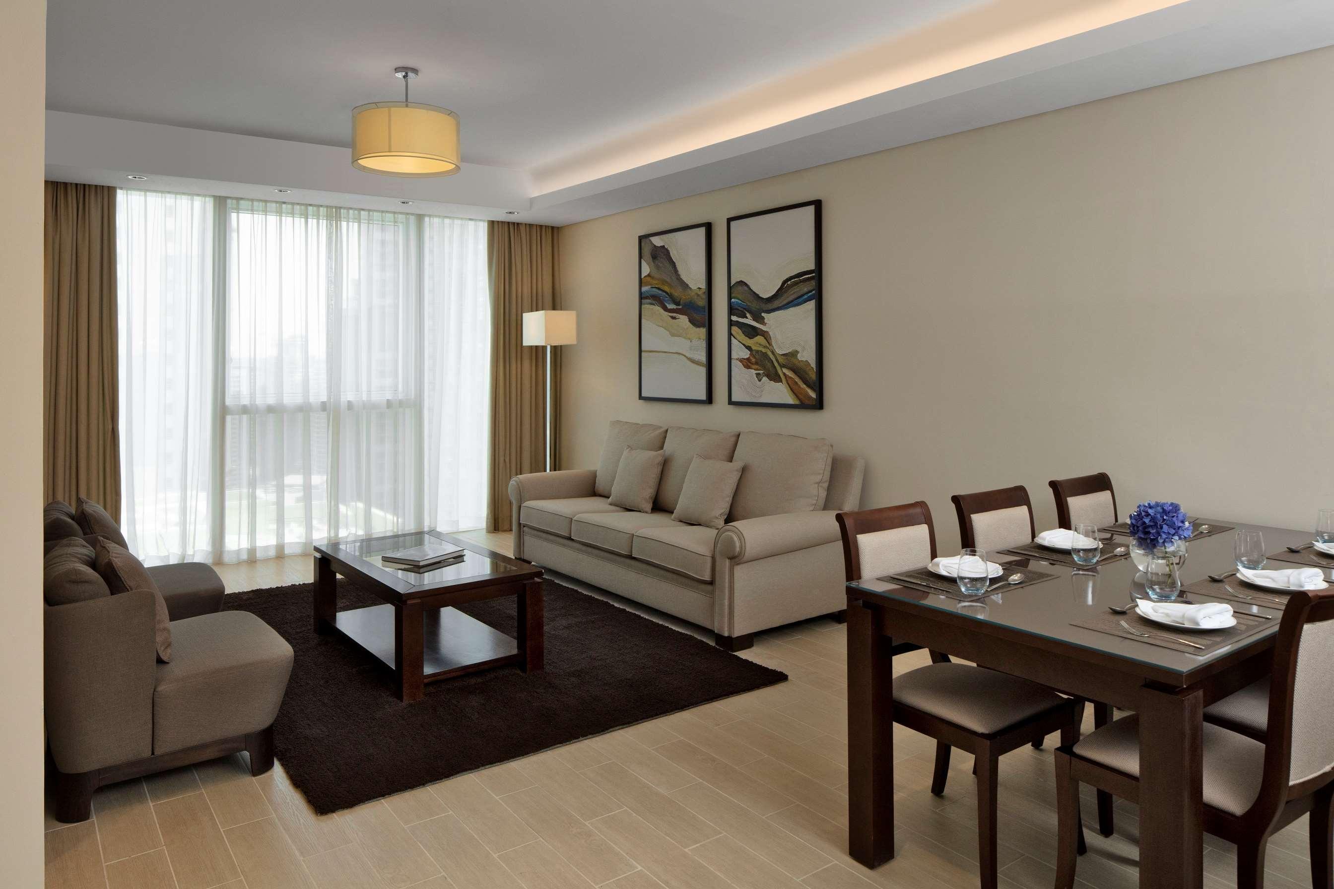 โรงแรมดุสิต โดฮา ภายนอก รูปภาพ A living room