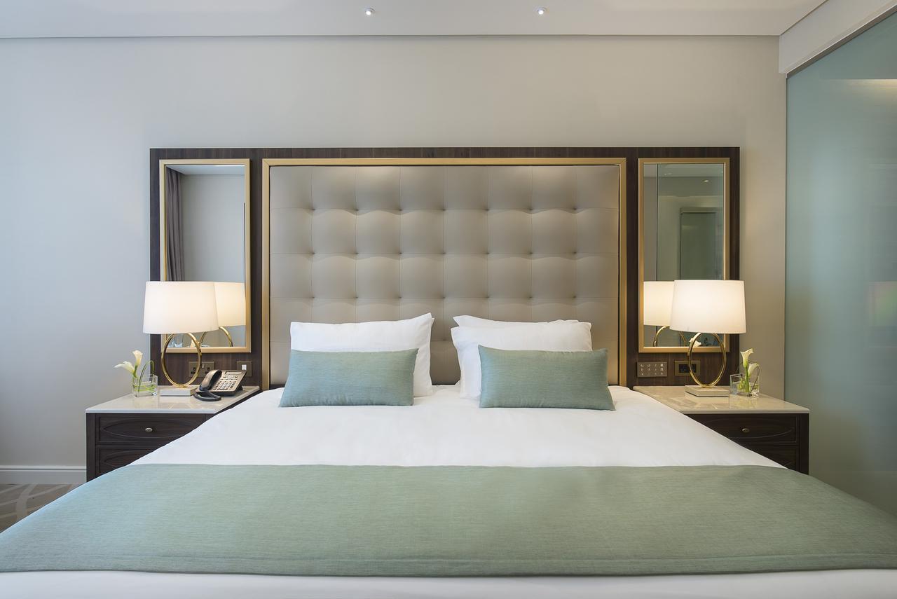 โรงแรมดุสิต โดฮา ภายนอก รูปภาพ A bedroom at the hotel