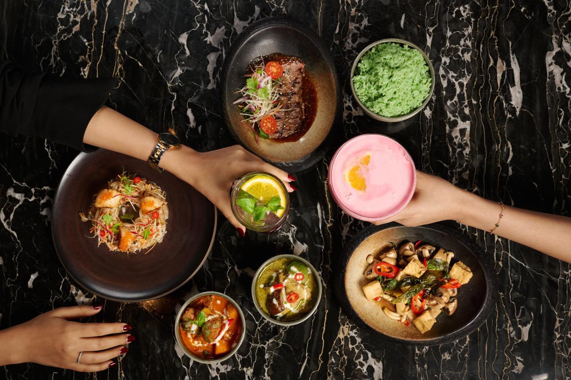โรงแรมดุสิต โดฮา ภายนอก รูปภาพ Dishes at the restaurant