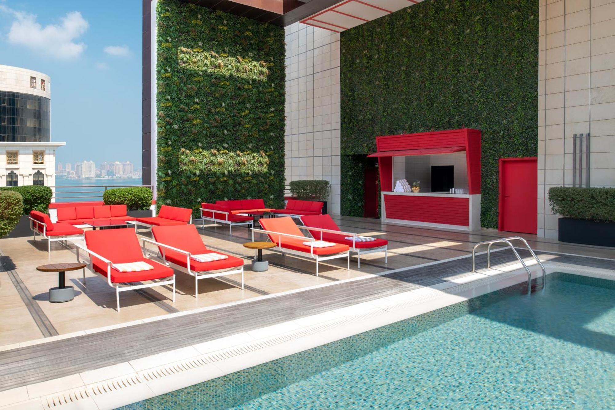 โรงแรมดุสิต โดฮา ภายนอก รูปภาพ The rooftop pool at The Hari